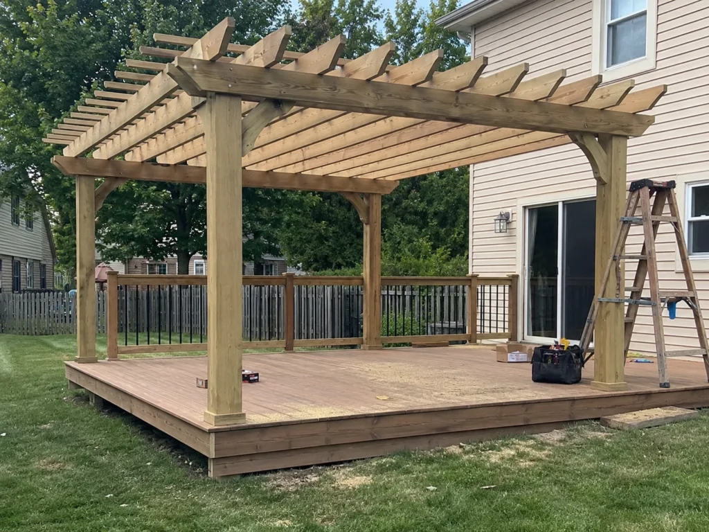 Freestanding wood pergola over deck in Iowa City, Iowa.