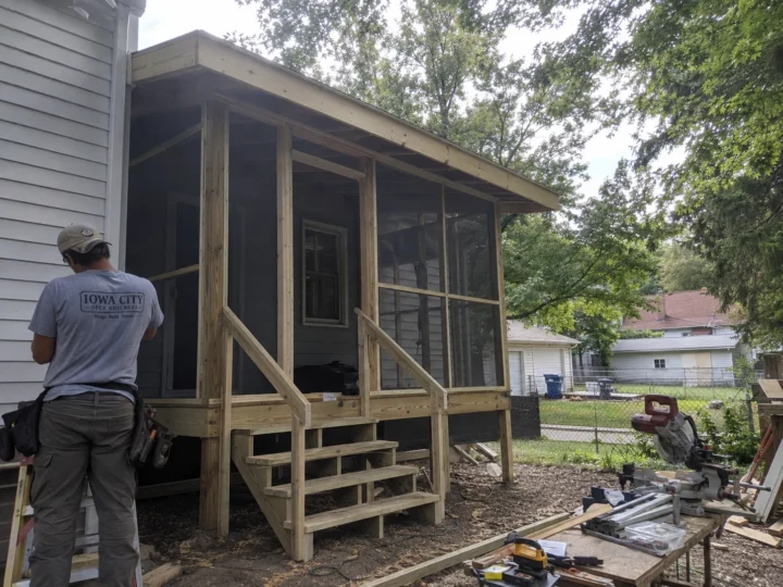 Screened porch deck framing under construction in Riverside, Iowa.